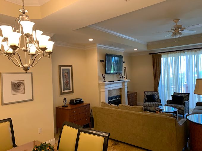 Open living and dining room with coordinated neutral wall colors